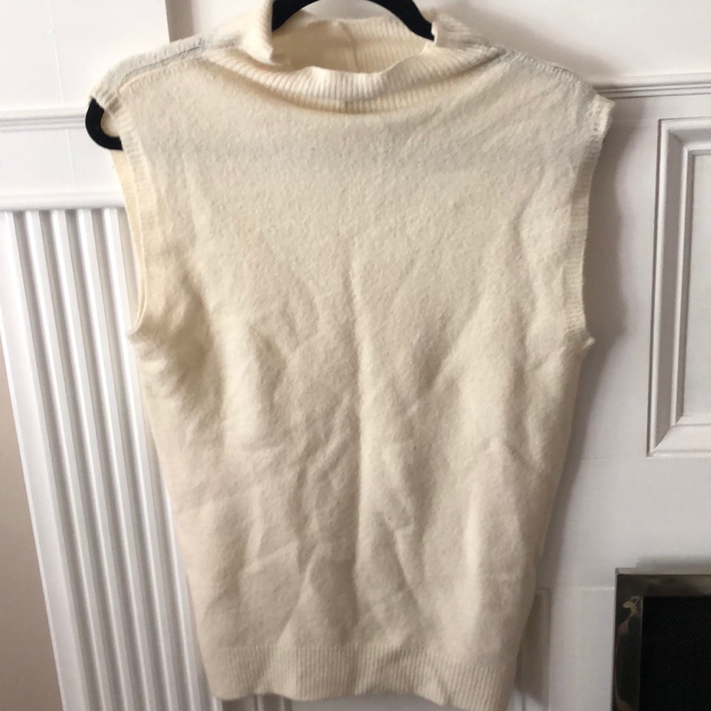Ivory sleeveless mock sweater